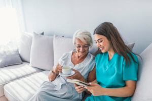 female caregiver with older client